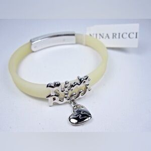 Nina Ricci White Silicone Bracelet w/ Dove Heart Charm | Adjustable 6.75–7.5”